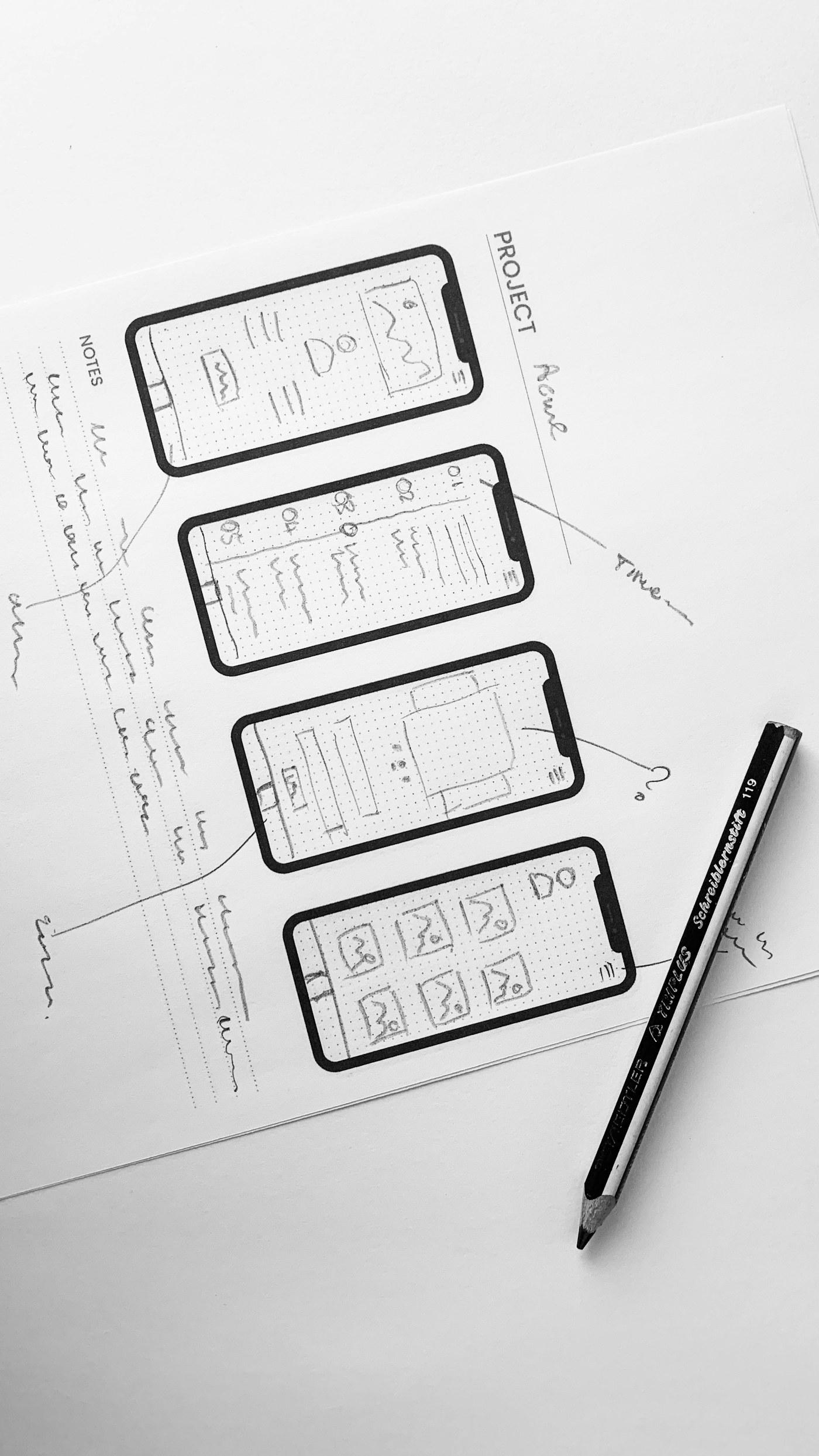 Pen sketches of app screens on white paper, with the pen beside them